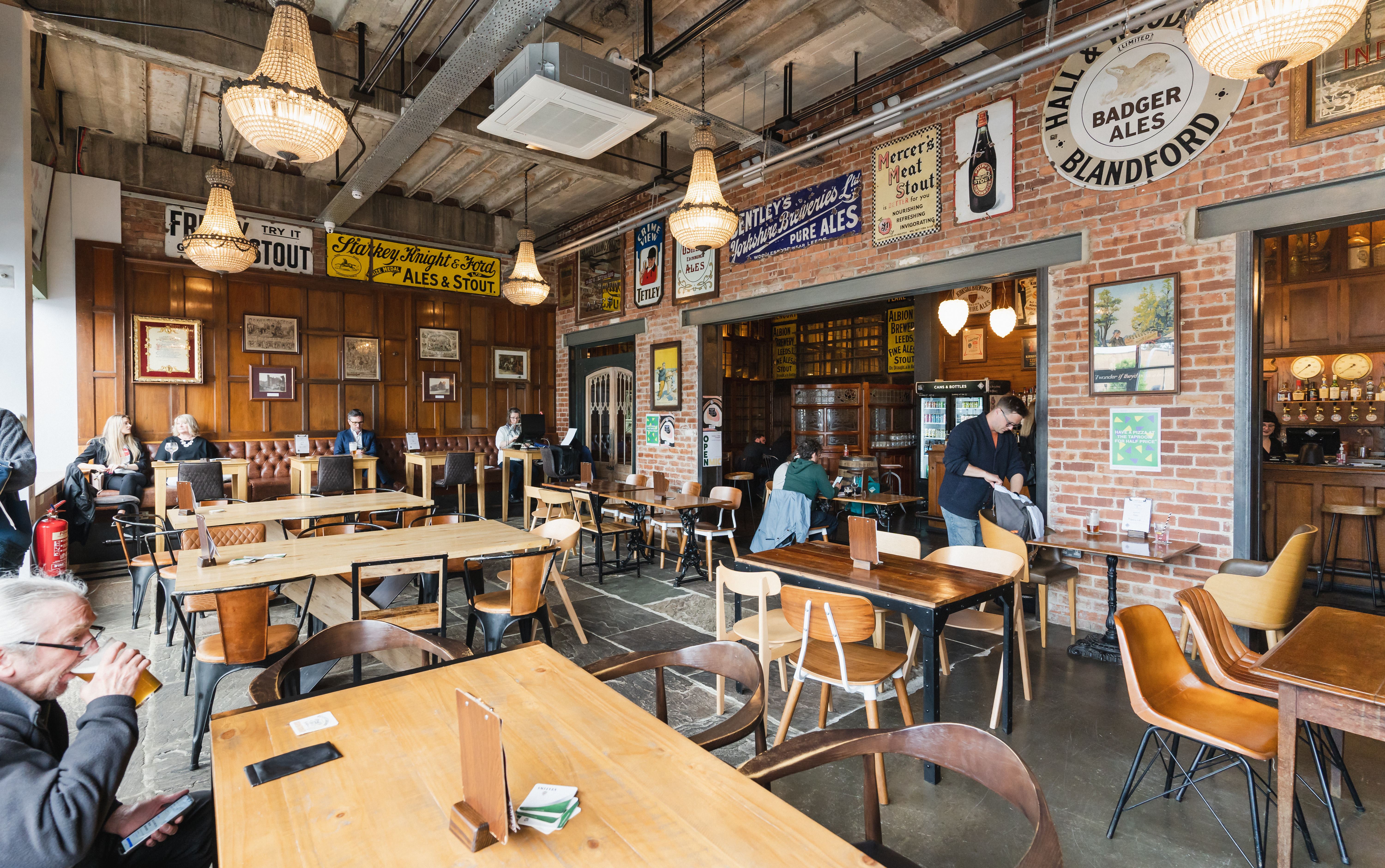 Kirkstall Brewery's cozy interior with wooden decor.