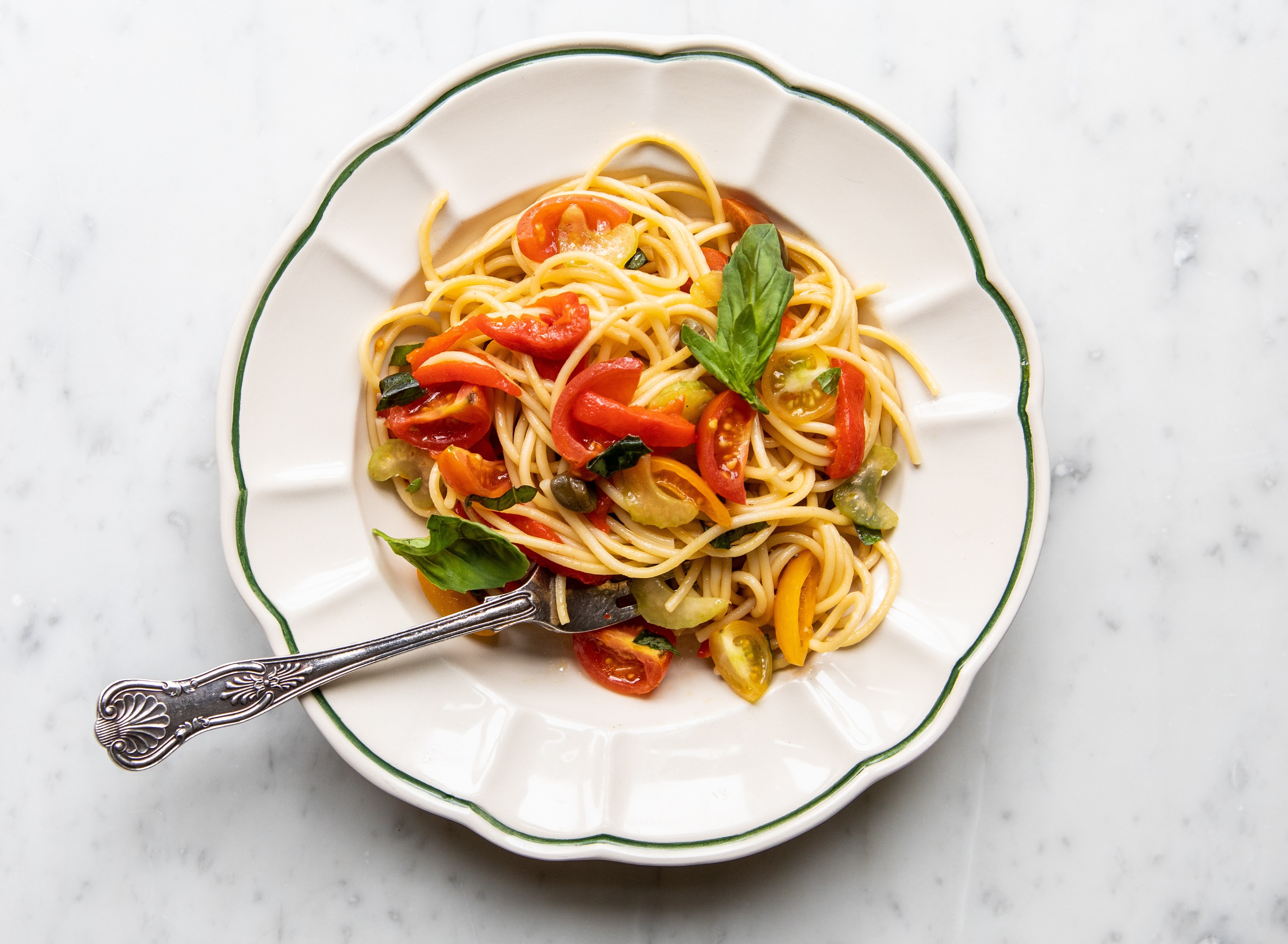 Spaghetti with tomatoes and basil.